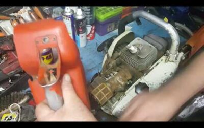 STIHL 08:Dépose carburateur,changer la durite de carburant et son équerre plastique.